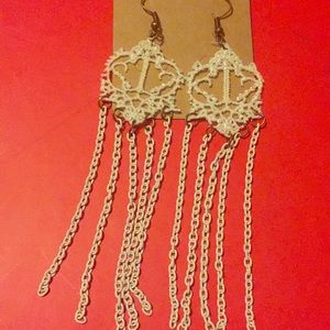 White dangle earrings